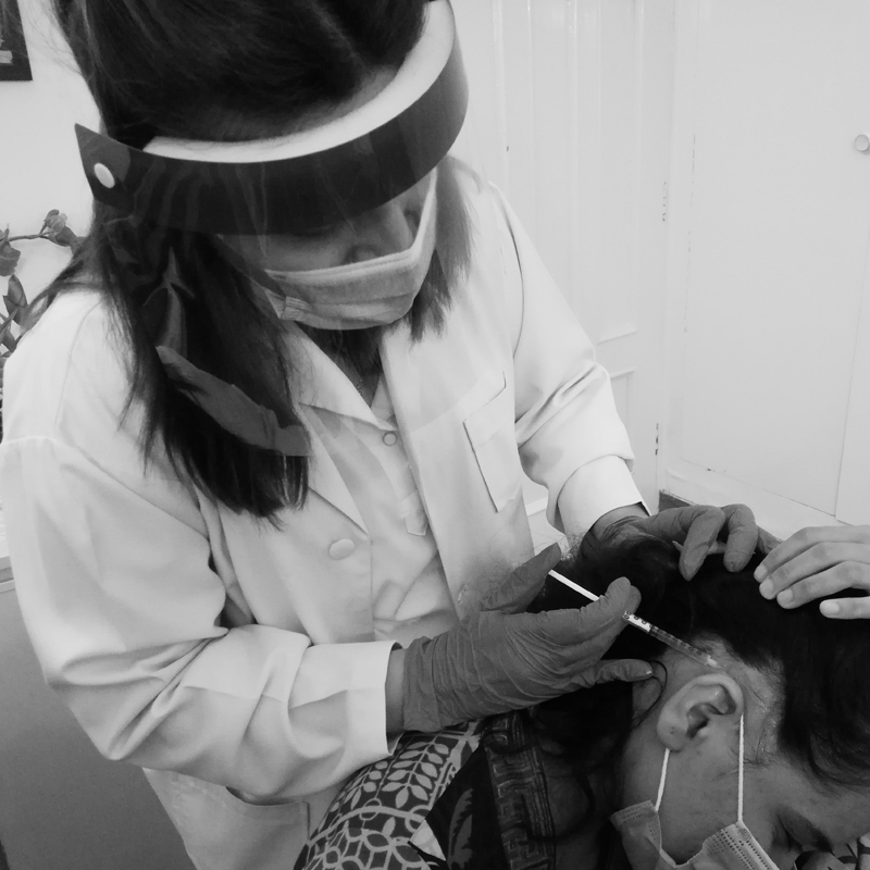 Dr Sarah Naeem performing PRP For Hair Treatment